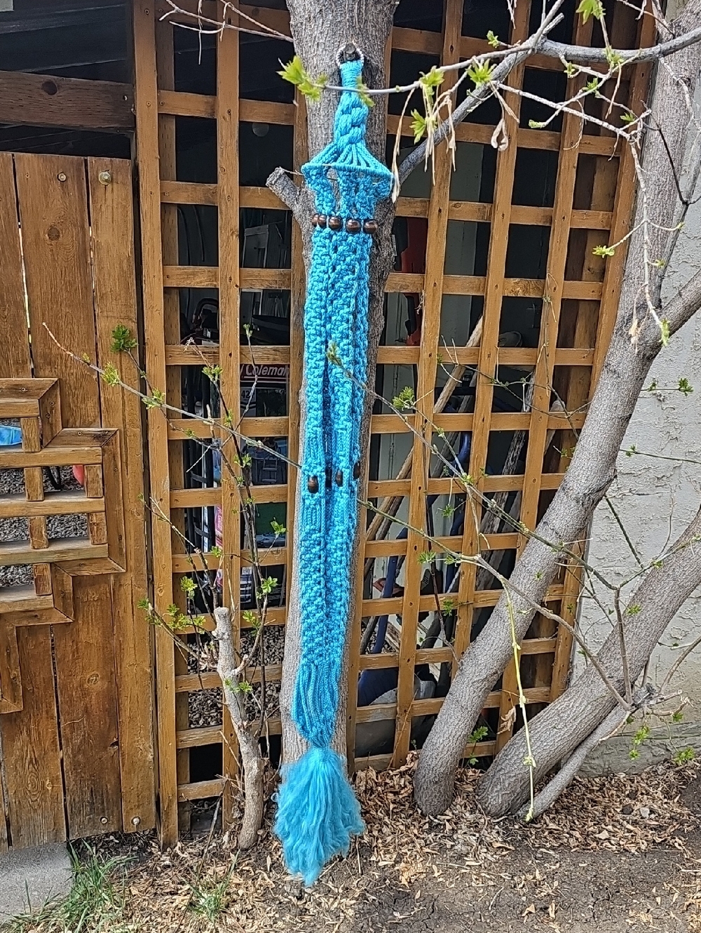 Teal Macramé Plant Hanger Featuring Brown Wooden Bead Accents Approximately 5'